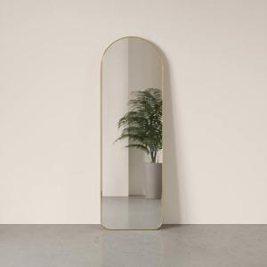1017062-104-curved-wall-mirror-umbra-hubba-brass-51x4x158-cm